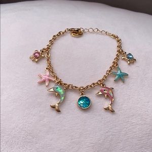 A children’s bracelet with dolphins